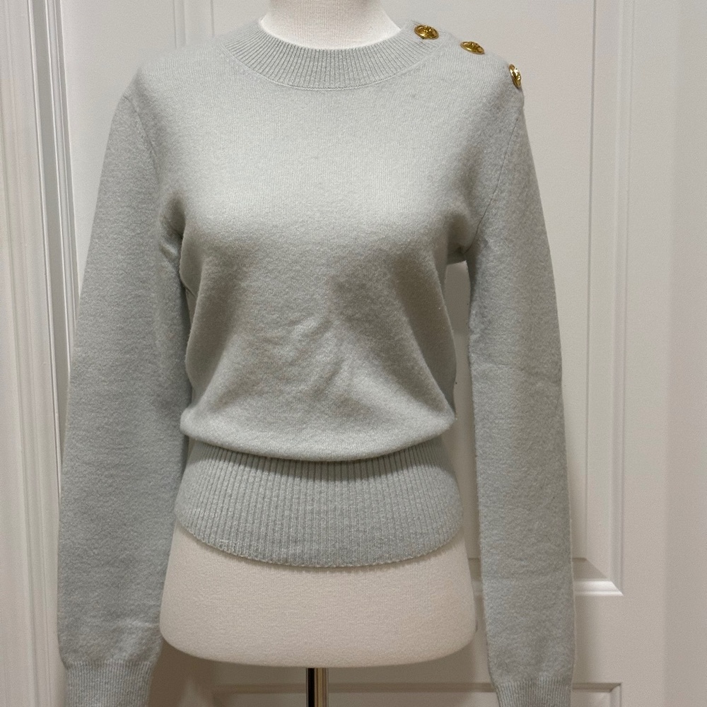 Tory Burch light blue sweater with gold buttons